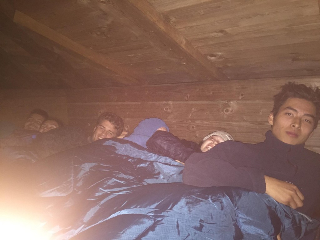 A group of people posing for the camera

Description automatically generated